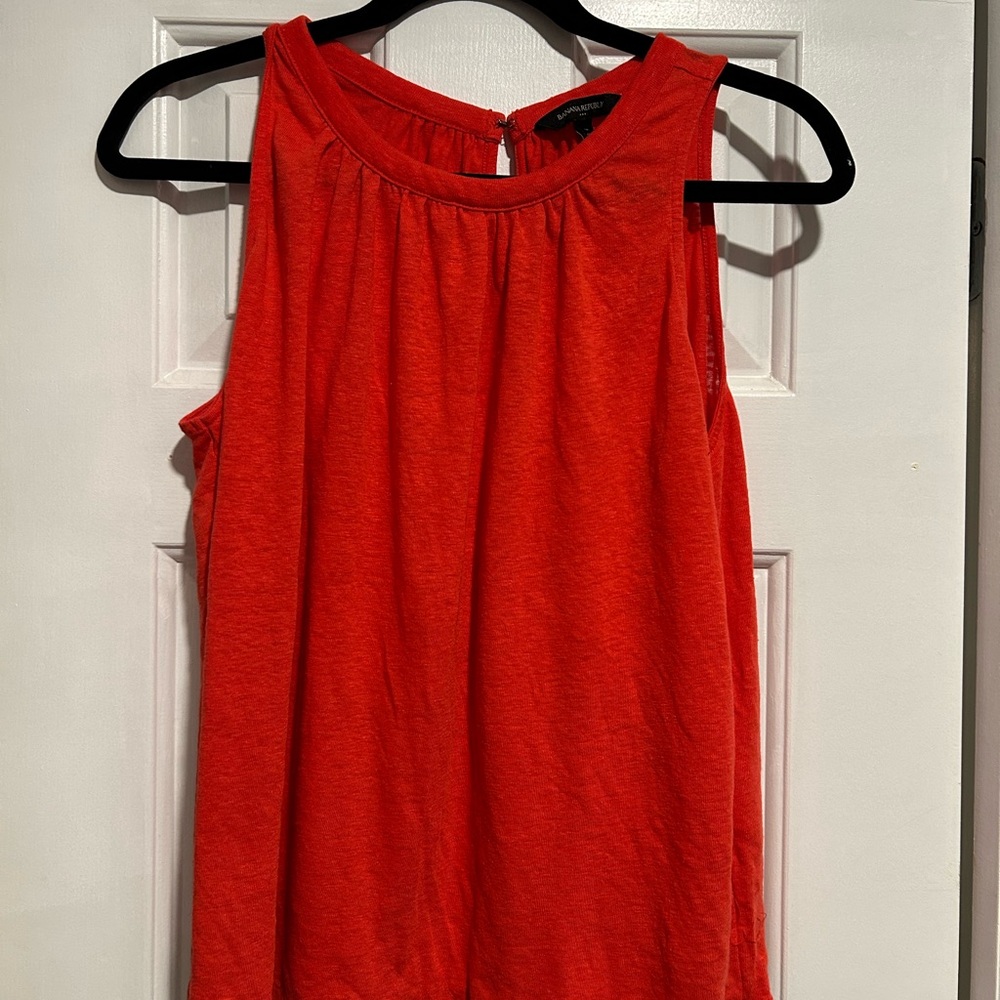 Sleeveless orange/melon top